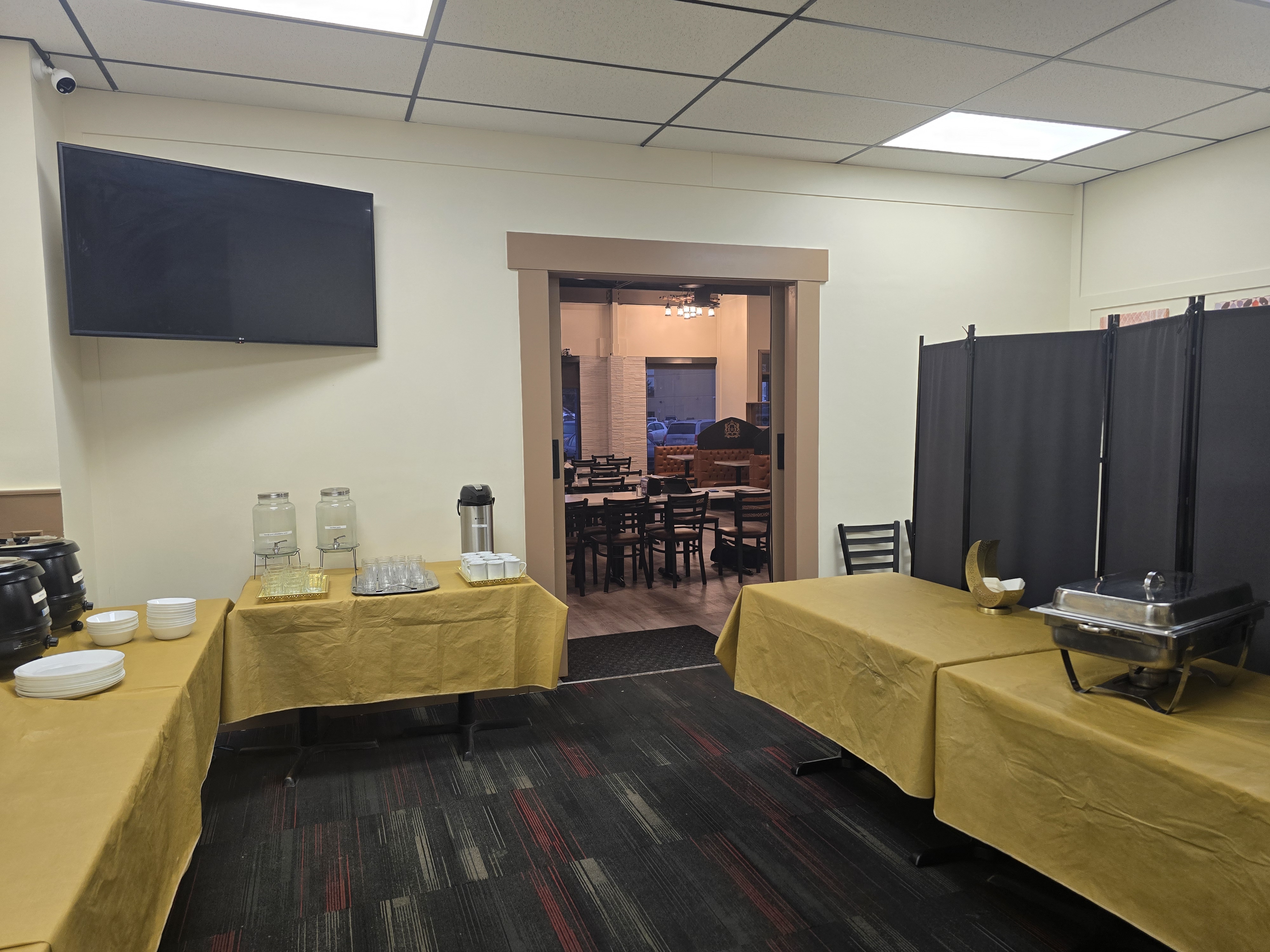 Traditional Moroccan tajine dishes served in hand-painted clay pots at Tajine House Restaurant Edmonton catering