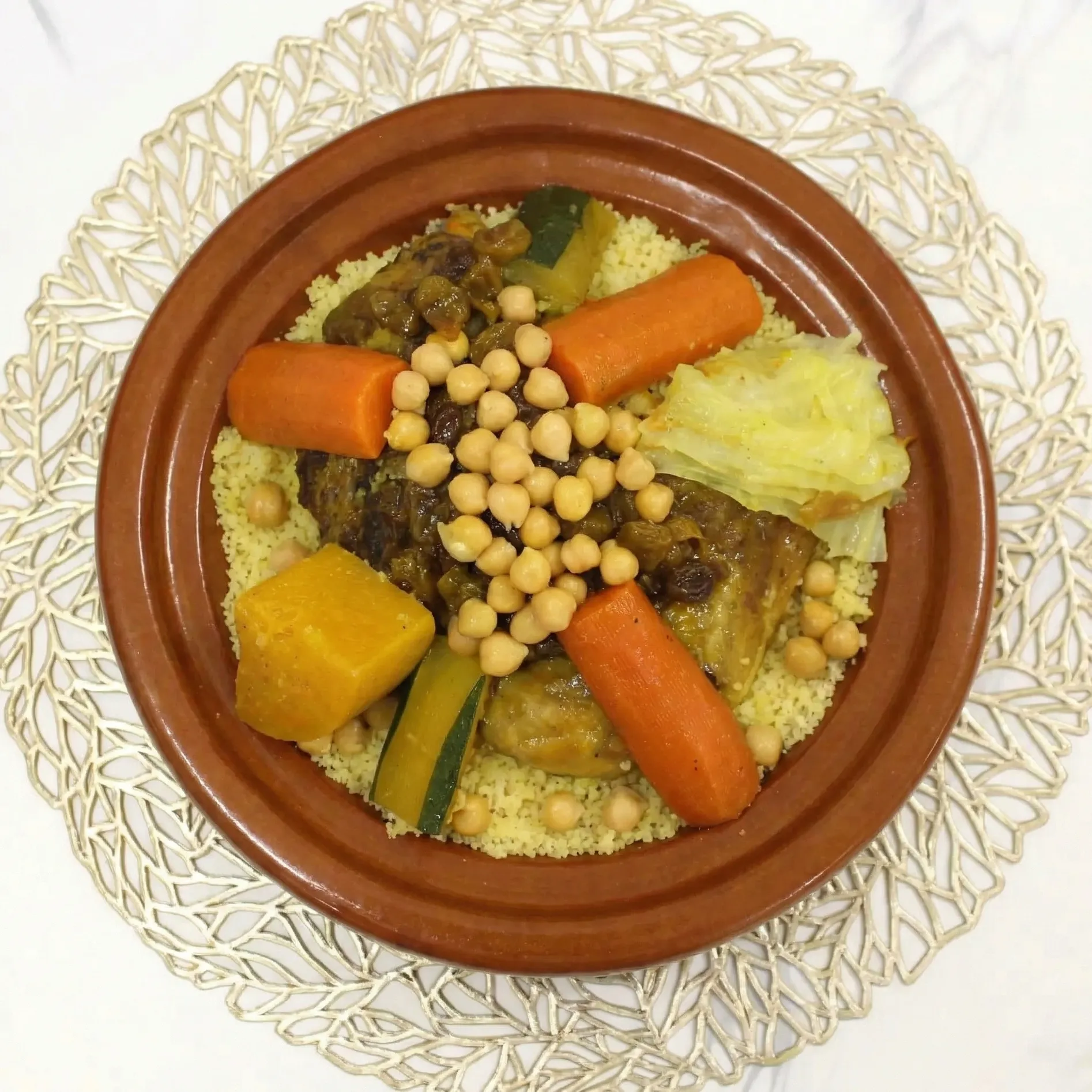 Moroccan couscous royal platter perfect for private parties and group events at Tajine House Restaurant Edmonton